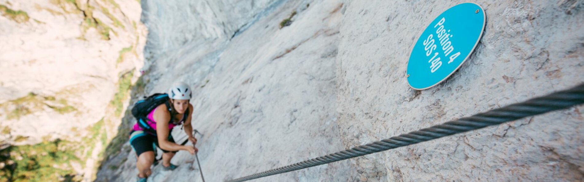 Woman in via ferrata