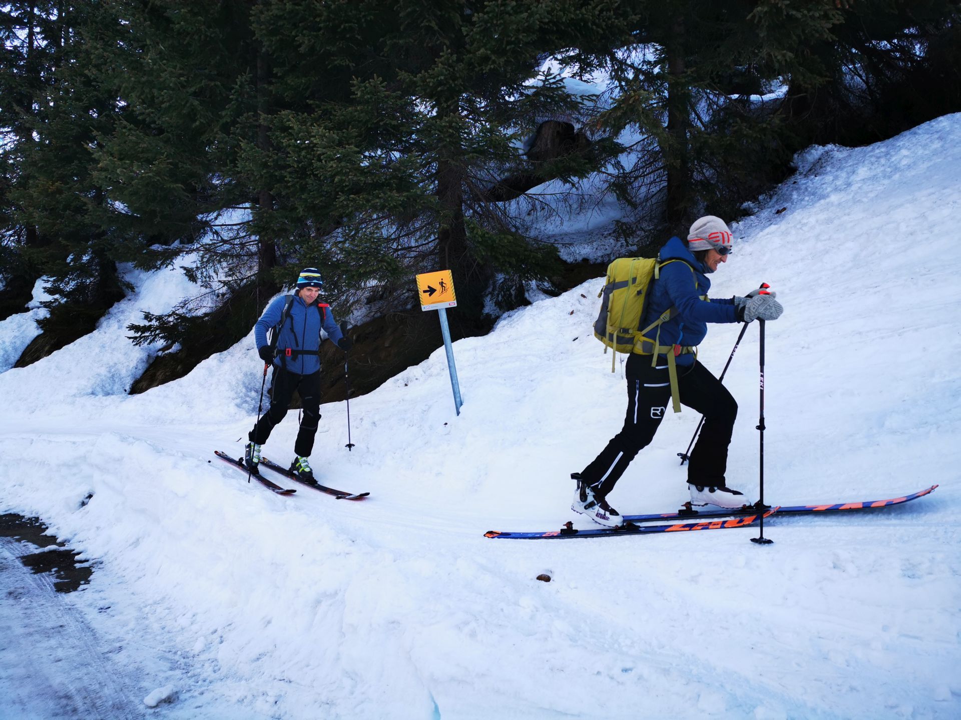 two ski mountaineers on the way up