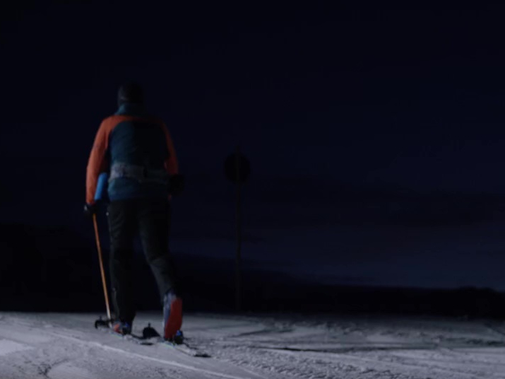 Piste tourers at dusk.